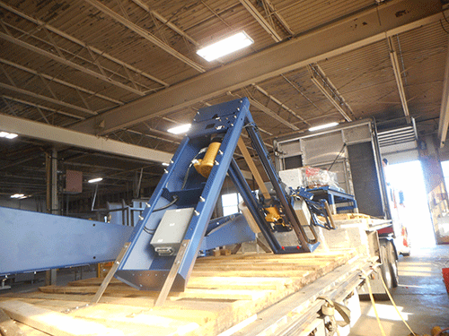 Step Deck Conestoga Trailer being loaded